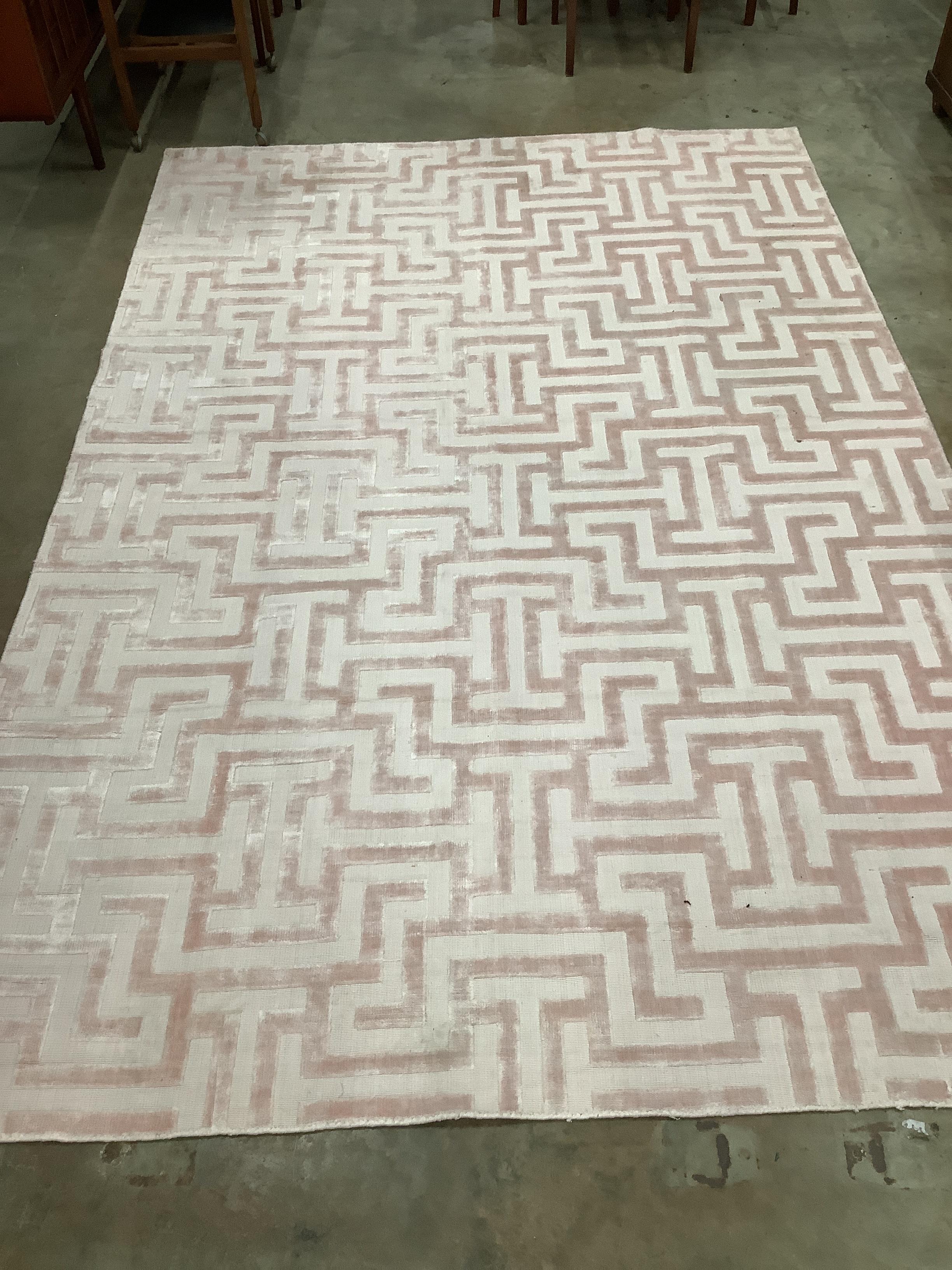 A contemporary part silk peach geometric carpet, 300 x 200cm***CONDITION REPORT***PLEASE NOTE:-