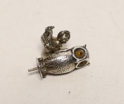 A George V silver miniature model of an owl, by Sampson Mordan & Co, Chester, 1910, 30mm and a