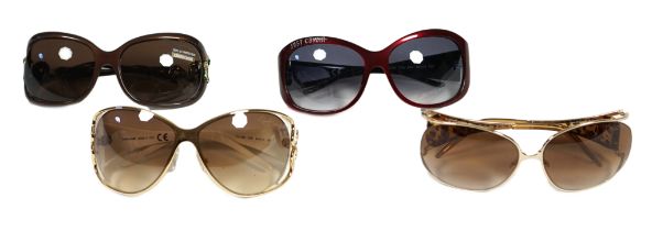 Four pairs of Roberto Cavalli lady's sunglasses without cases.***CONDITION REPORT***Varying