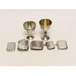 An early 20th century Russian 84 zolotnik egg cup, 69mm a later silver egg cup and five assorted