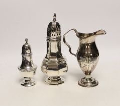 A George V silver pepperette, a silver plated sugar caster and a plated on copper cream jug.***