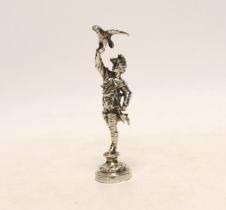 A late Victorian silver miniature model of a Falconer, on a circular base, import marks for Berthold