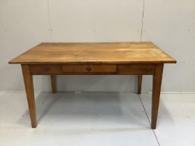 An early 20th century oak kitchen table with frieze drawer, width 148cm, depth 89cm, height 74cm***