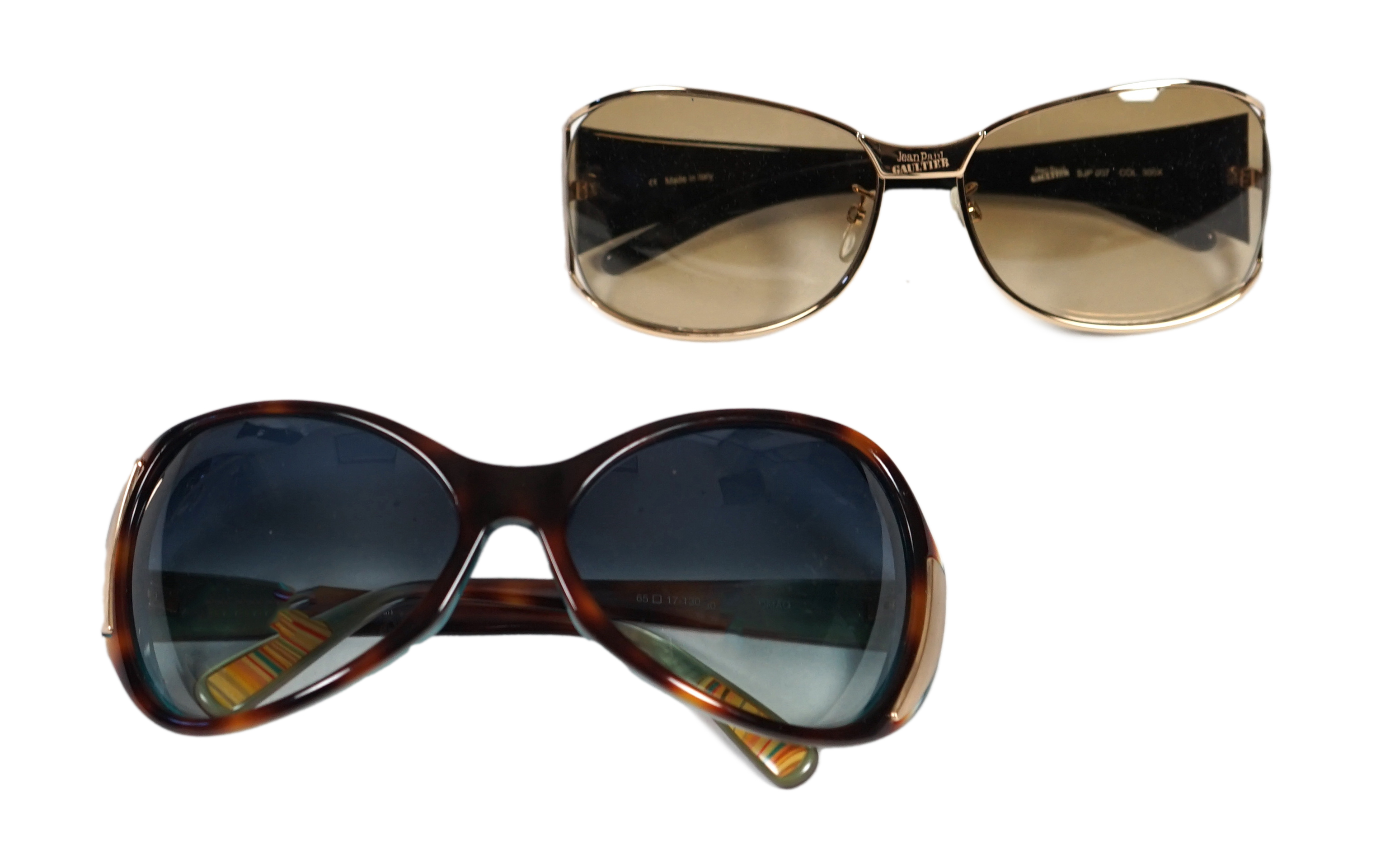 A pair of Paul Smith and a pair of Jean Paul Gautier lady's sunglasses with cases.***CONDITION