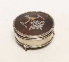 A George V silver and tortoiseshell pique circular trinket box, Goldsmiths & Silversmiths Co Ltd,