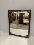 An Edwardian marquetry inlaid oak wall mirror with bevelled plate, width 108cm, height 87cm***