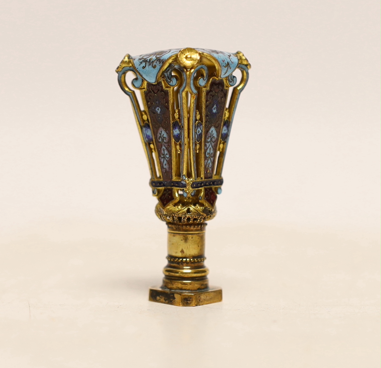 A late 19th century French cased gilt metal and champleve enamel desk seal, 5.5cm high***CONDITION