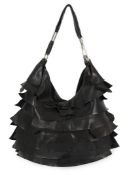 A vintage Yves Saint Laurent Chevre Ruffle Saint Tropez shoulder bag in black leather, designed by