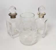 A pair of silver collared decanters and stoppers and two glass vases, decanters 26cm***CONDITION