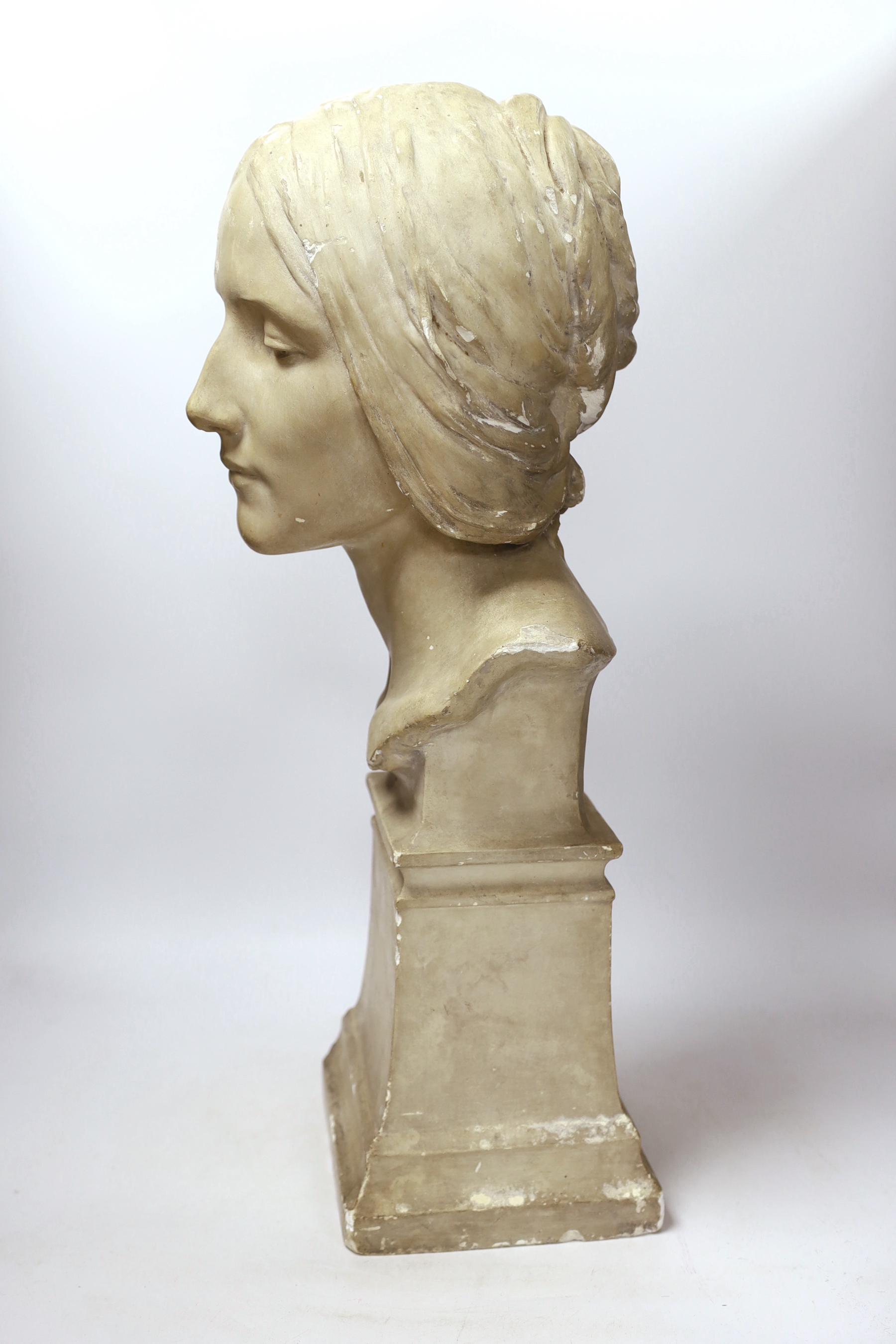 A plaster bust of a woman’s head on a square pedestal, 58cm***CONDITION REPORT***PLEASE NOTE:- - Image 2 of 3