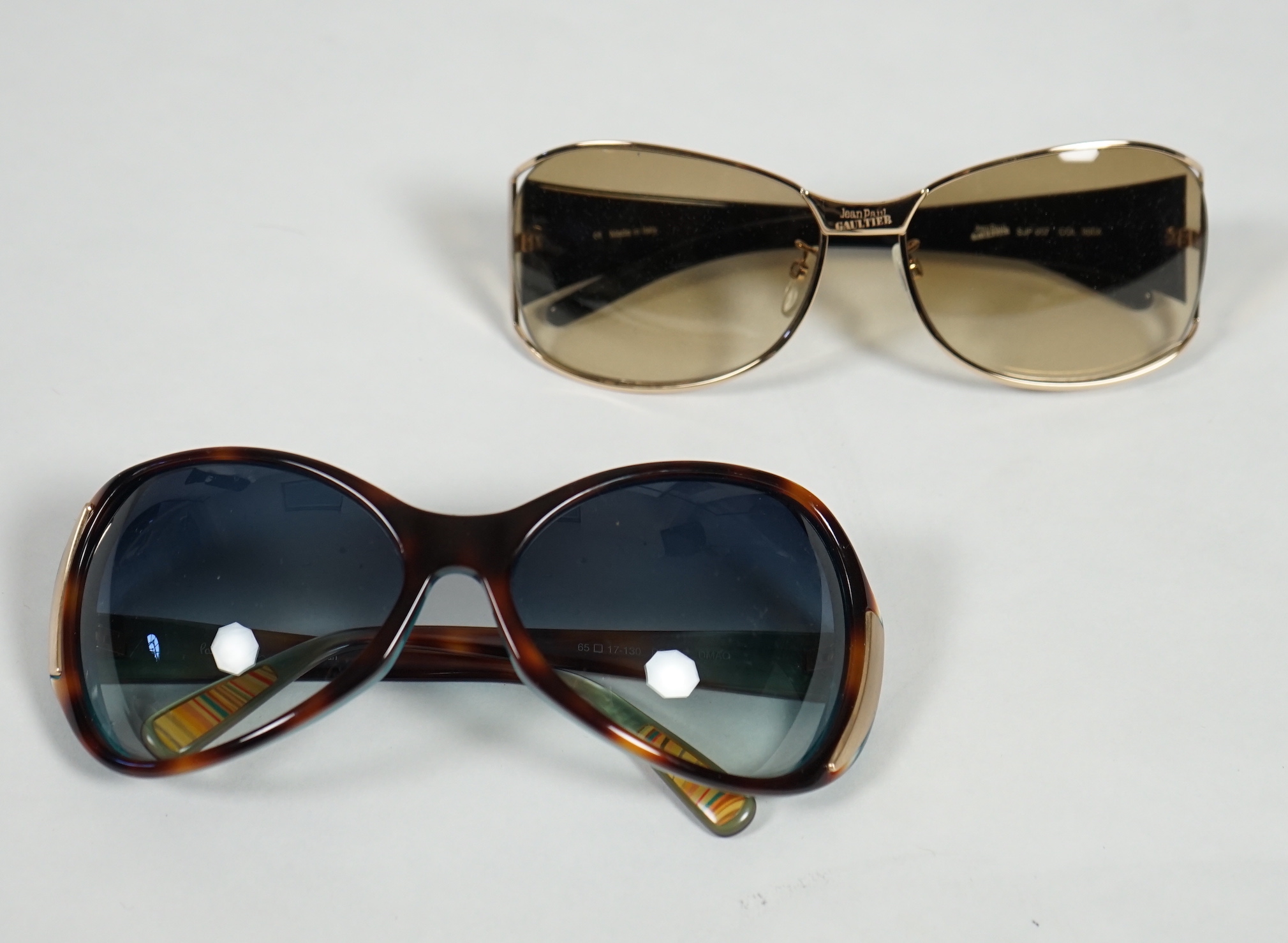 A pair of Paul Smith and a pair of Jean Paul Gautier lady's sunglasses with cases.***CONDITION - Image 3 of 6