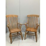 A pair of stained beech lathe back elbow chairs, height 112cm***CONDITION REPORT***PLEASE NOTE:-