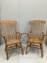 A pair of stained beech lathe back elbow chairs, height 112cm***CONDITION REPORT***PLEASE NOTE:-
