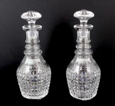 * * A pair Regency style of hob nail cut glass decanters and stoppers, c.1900Please note this lot