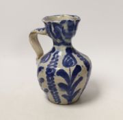 An 18th century Spanish maiolica jug, Grenada, 17cm***CONDITION REPORT***PLEASE NOTE:- Prospective