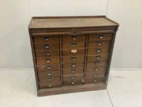 An early 20th century oak Globe Wernicke office filing cabinet with tambour front, width 106cm,