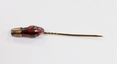 A late Victorian yellow metal, garnet and diamond set serpent head stick pin, 65mm, gross weight 2.9