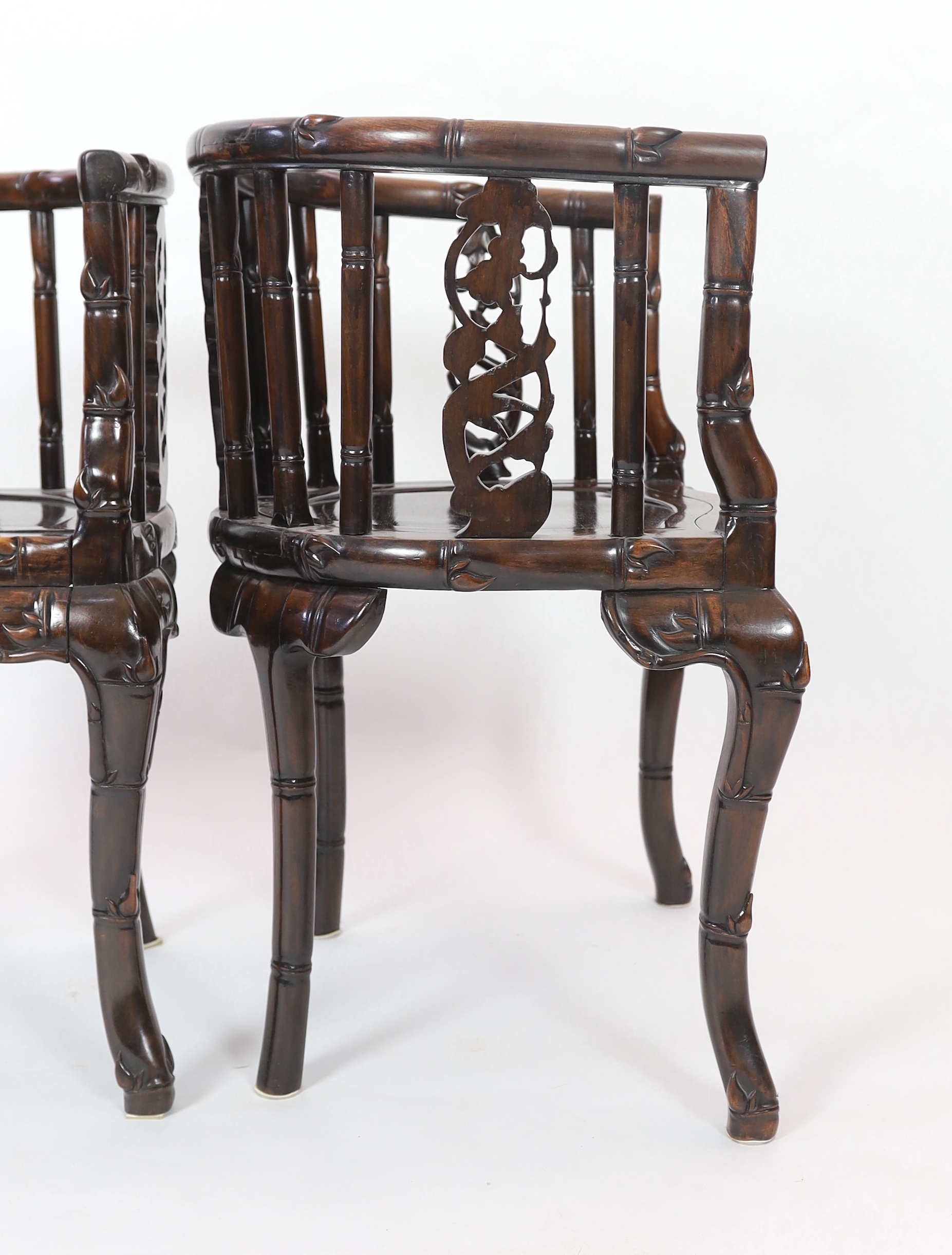 A pair of Chinese hongmu tub-shaped armchairs, late 19th century, carved in imitation of bamboo - Image 3 of 3