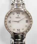 A lady's 2001 stainless steel Ebel quartz wrist watch, with diamond set bezel, mother of pearl