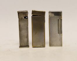 Three assorted Dunhill lighters***CONDITION REPORT***PLEASE NOTE:- Prospective buyers are strongly