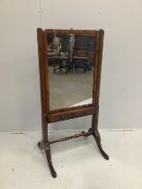 A George III mahogany adjustable cheval glass with mid tier drawers, width 57cm, extends to a height