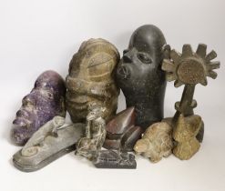 Ten Shona stone carvings, 1960s-70s, including three heads, the first in purple Lepodolite signed
