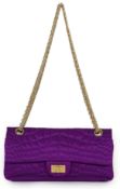 A Chanel medium-sized 2-55 bag in purple silk satin stitched with a quilted crocodile pattern,