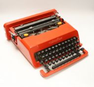 An Olivetti Valentine typewriter in red plastic case***CONDITION REPORT***PLEASE NOTE:-