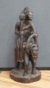 A West African tribal figure of a warrior on horseback, probably Dogon, 57cm high