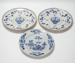 A pair of late 18th century Delft plates and an English delftware plate (3)