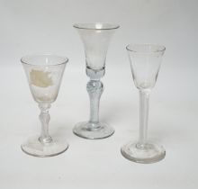 Three 18th century air twist stemmed wine glasses, tallest 16.5cm high