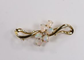 A 14k and six stone white opal cluster set brooch, 45mm, gross weight 5 grams.