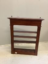 A George III style mahogany four tier wall bracket, width 73cm, depth 16cm, height 90cm