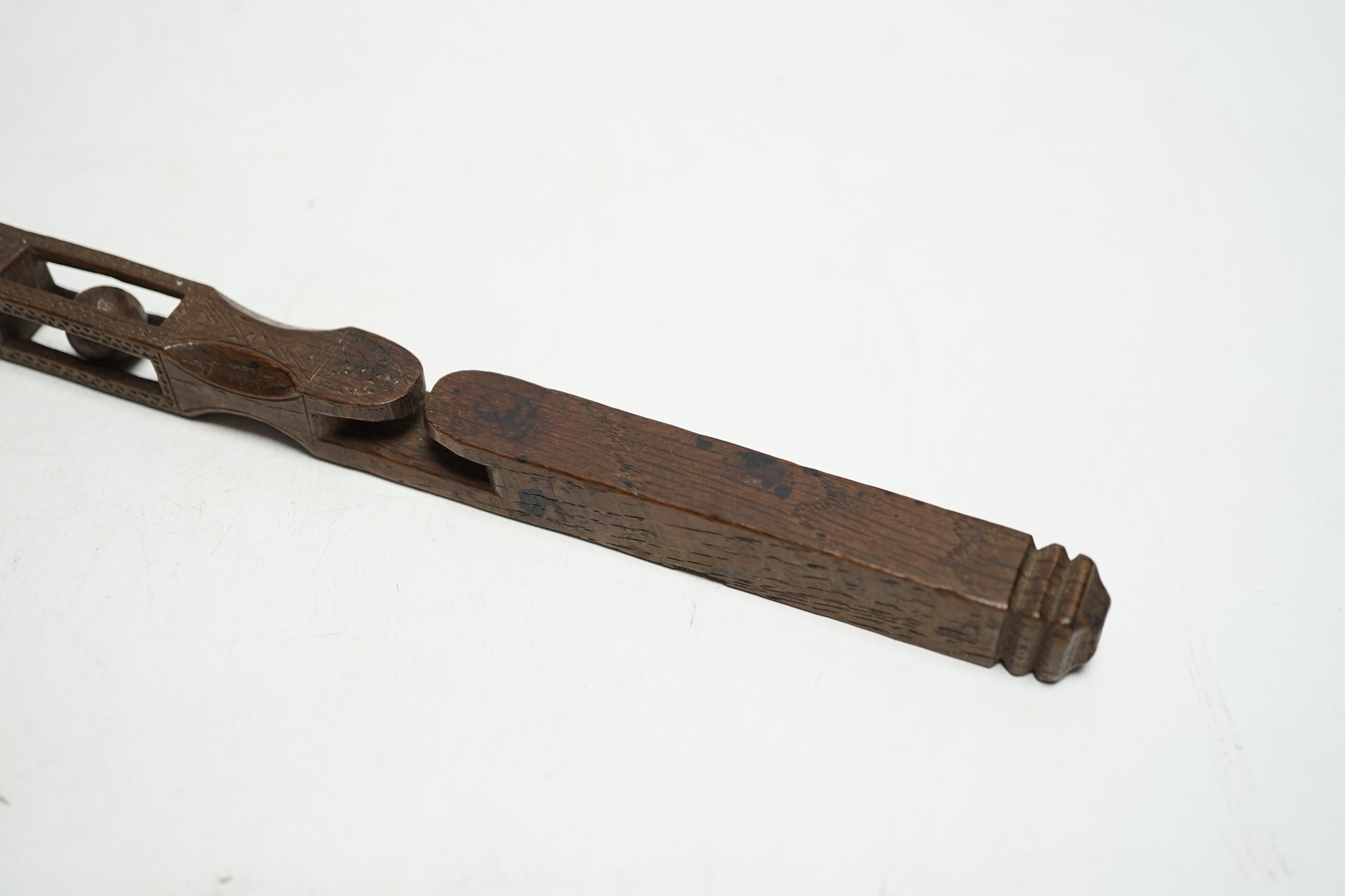 An 18th century carved wood love token, probably Welsh, 21.5cm - Image 3 of 4