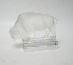 Rene Lalique, a frosted glass paperweight modelled as a bison, signed ‘Lalique France’ to base 12.