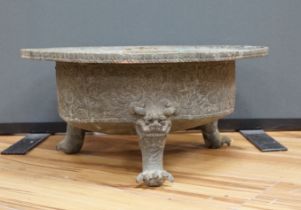 A large and heavy Chinese bronze tripod basin, Xuande mark but 19th century, the broad rim cast in