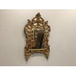 A small 18th century style gilt composition marginal plate wall mirror, width 55cm, height 94cm