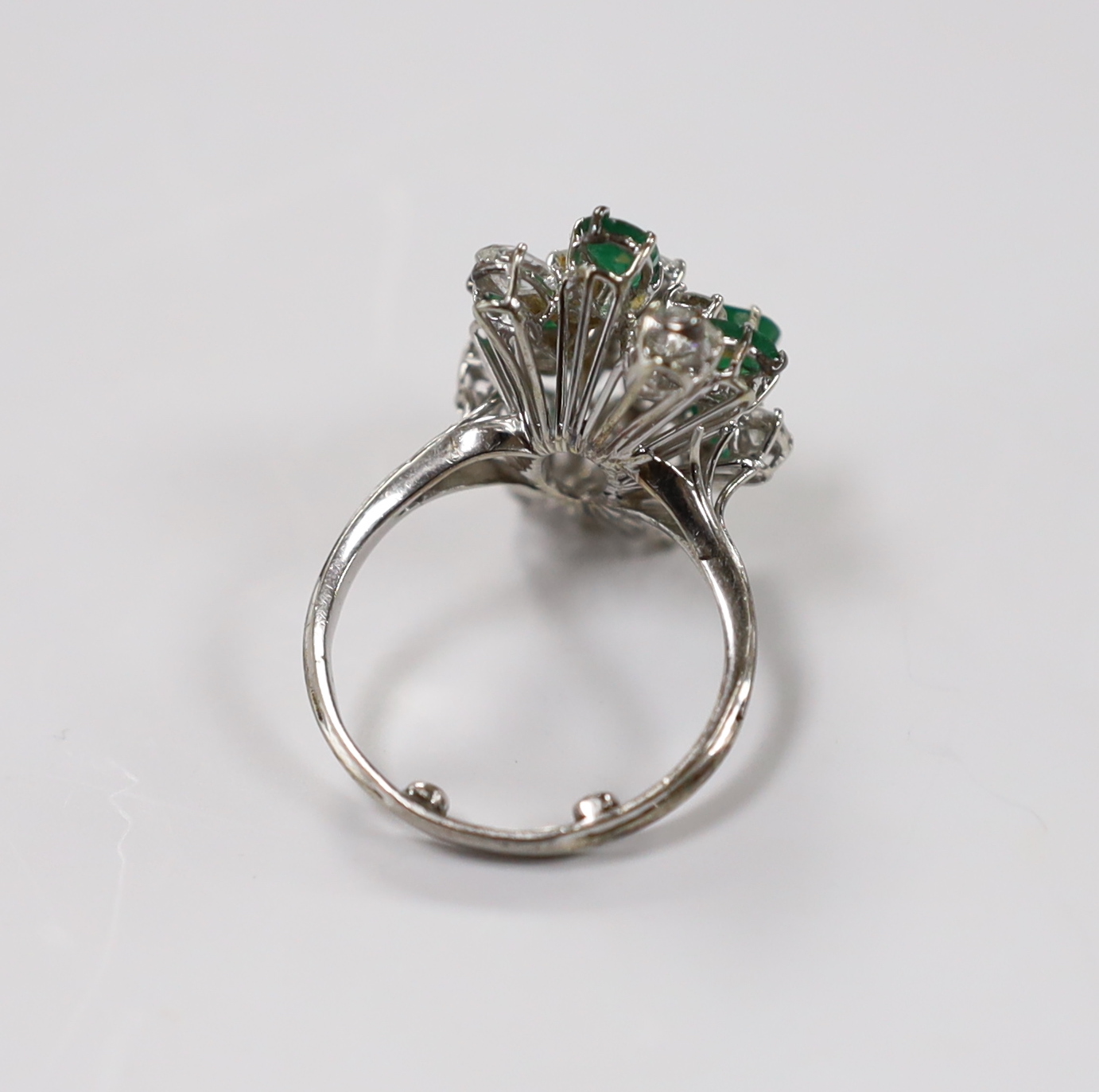 A modern white metal emerald and diamond cluster set dress ring, size R/S, the shank with two sizing - Image 3 of 3
