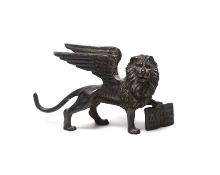 * * A Grand Tour miniature bronze Winged Lion of St. Mark, late 18th century, 7.5cm wide