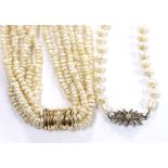 A modern multi strand freshwater? pearl choker necklace, with diamond set 585 barrel shaped clasp,
