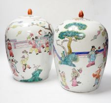 A pair of Chinese famille rose ovoid jar and covers, 32cm high