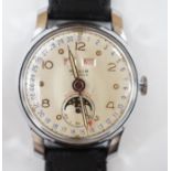 A gentleman's 1950's? stainless steel Galia calendar moonphase manual wind wrist watch, on an