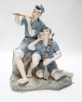 A Chinese Cultural revolution figure group, communist soldiers, 32cm high