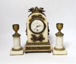 A French marble and ormolu clock garniture, early 20th century, clock 21cm high