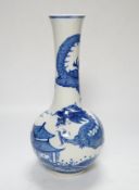 A Chinese blue and white dragon vase, 27cm high