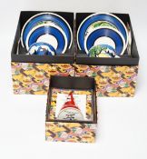 Two Wedgwood Clarice Cliff limited edition May Avenue trios together with a carpet conical sugar,