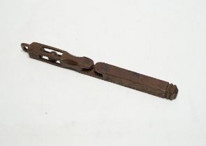 An 18th century carved wood love token, probably Welsh, 21.5cm