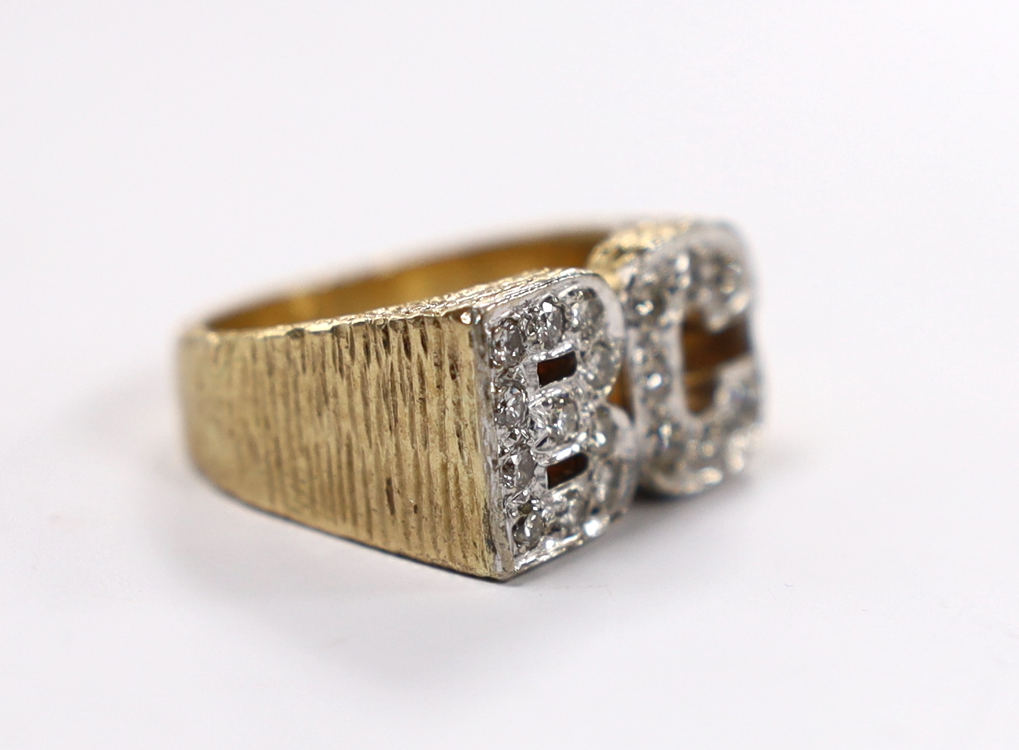 A textured 9ct and diamond cluster set 'BC' initials ring, size Q, gross weight 14.3 grams. - Image 2 of 3