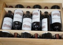 Twelve bottles of Chateau Laffitee Carcasset, 1983, in OWC