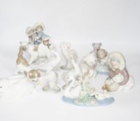 Eleven Lladro figure groups, including a collection of ducks, two Eskimo figure groups, a sleeping